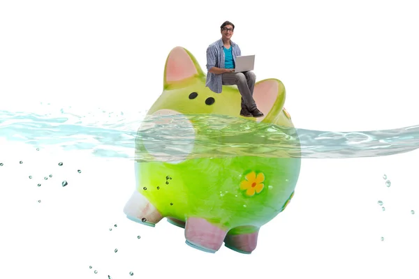 Student debt concept with piggybank and student — Stock Photo, Image