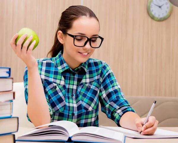 Young female student preparing for exams — Stock Photo, Image