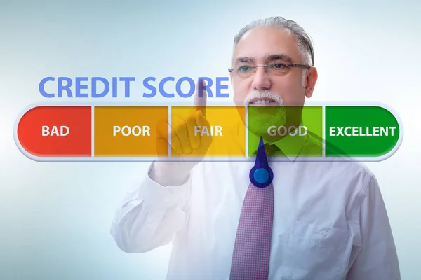 Businessman in credit score concept — ストック写真