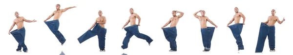 Man in dieting concept with oversized jeans — Stock Photo, Image