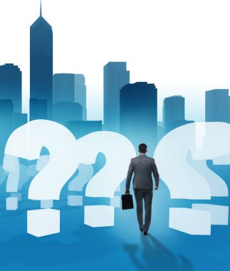 Soru işaretleriyle belirsizlik konseptinde iş adamı