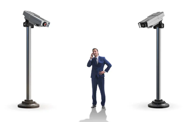 Cameras wathing man in spying concept — Stock Photo, Image