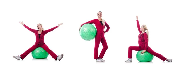 Young woman with ball exercising on whitee — Stock Photo, Image