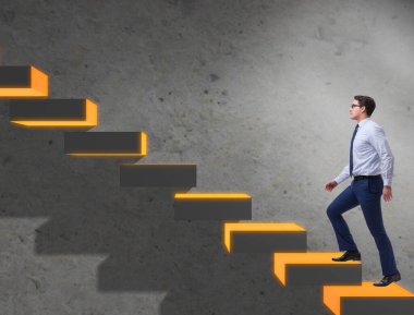 Genç işadamı tırmanma kariyer basamaklarını