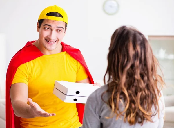Superhero pizza delivery guy with red cover — Stock Photo, Image