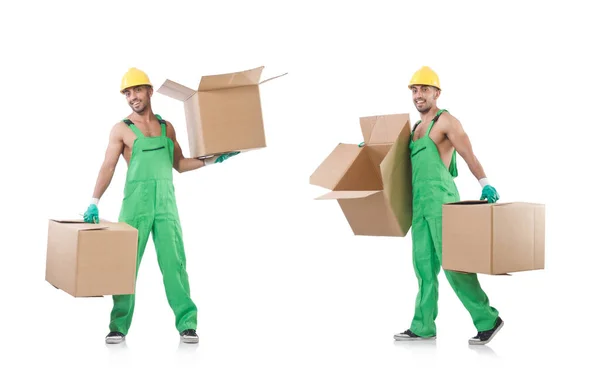 Hombre en mono verde con cajas —  Fotos de Stock