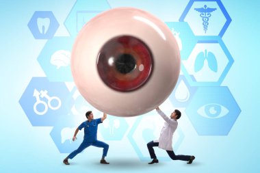 Doktor dev gözü tıbbi konseptte inceliyor.