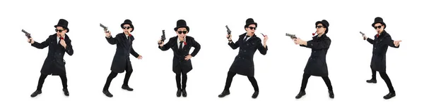 Jovem detetive de casaco preto segurando arma isolada no branco — Fotografia de Stock