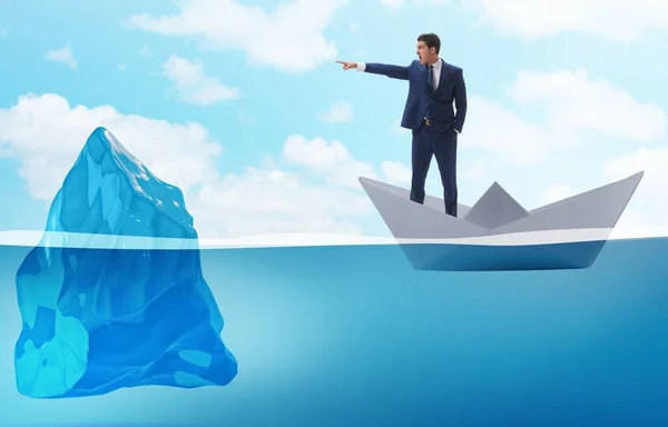 BUsinessman showing directions to avoid problems as iceberg — Stock Photo, Image