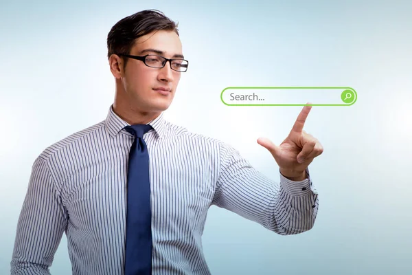 Search concept with businessman pressing button — Stock Photo, Image