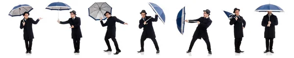 Ung man med paraply isolerad på vitt — Stockfoto
