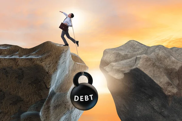 Koncept dluhu a zatížení s podnikatelem — Stock fotografie