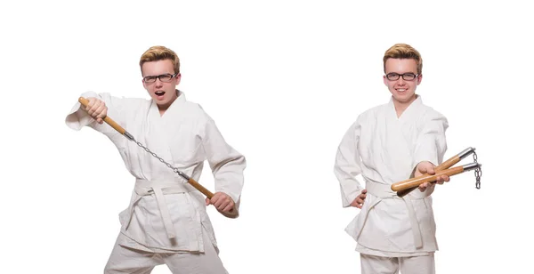 Legrační karate bojovník s nunčaky na bílém — Stock fotografie