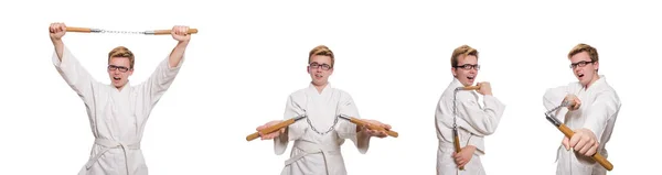 Divertido luchador de karate con nunchucks en blanco — Foto de Stock