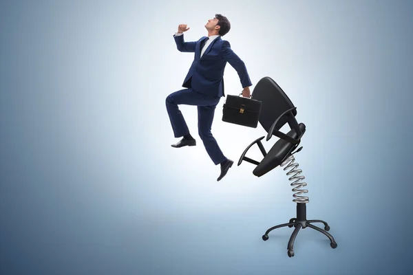 Concept de promotion avec homme d'affaires éjecté de la chaise — Photo