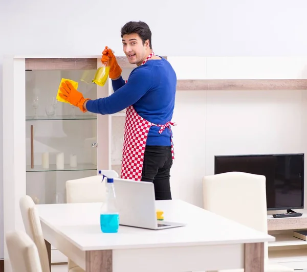 Contractor man cleaning house doing chores — Stock Photo, Image