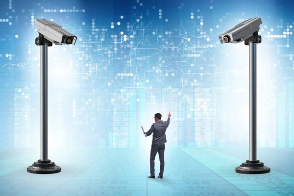 Cameras wathing man in spying concept — Stock Photo, Image