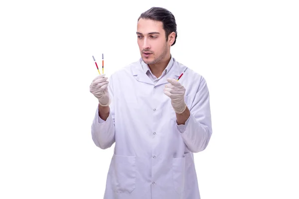 Молодий красивий лікар зі шприцом ізольований на білому — стокове фото