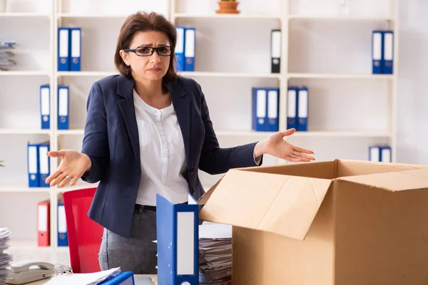 Middle-aged female employee being fired from her work — Stock Photo, Image