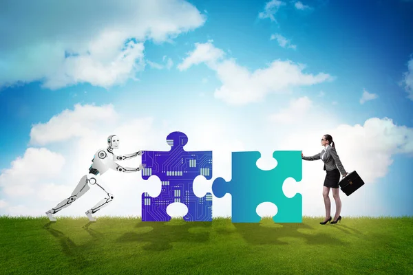 Robot och människa samarbetar i pussel — Stockfoto
