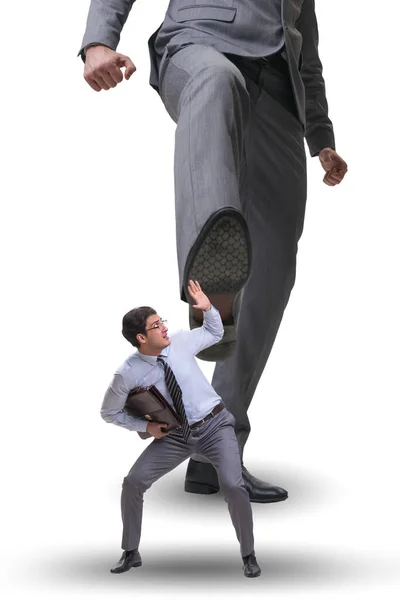 Bad angry boss kicking employee in business concept — Stock Photo, Image