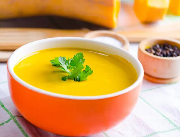 Pumpkin soup served on the table in bowl — Stock Photo, Image
