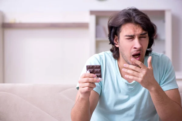 Young man suffering from allergy — Stock Photo, Image