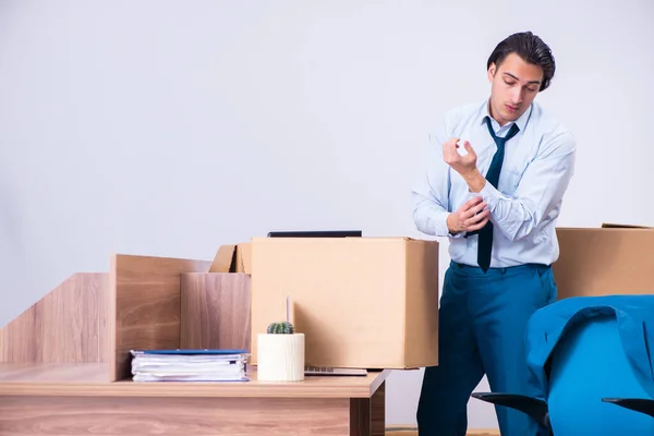 Young handsome businessman being fired from his work — Stock Photo, Image