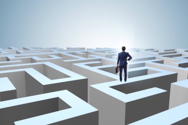İşadamı labirentten kaçmaya çalışıyor.