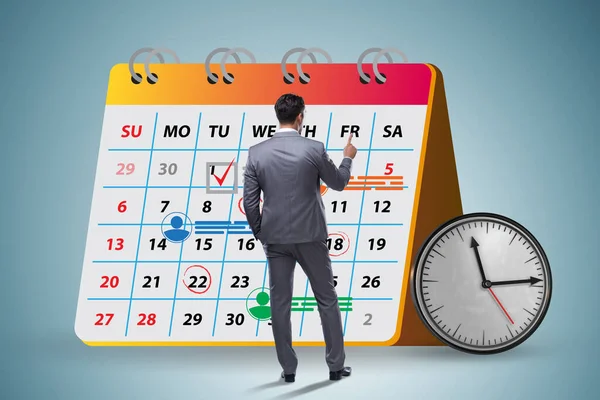 Concetto di calendario aziendale con uomo d'affari — Foto Stock