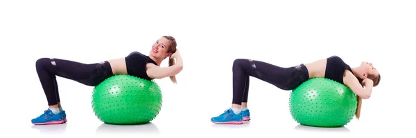 Mulher fazendo exercícios com bola no branco — Fotografia de Stock