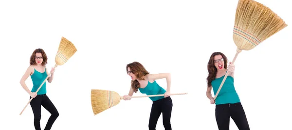 Young woman with broom on white — Stock Photo, Image