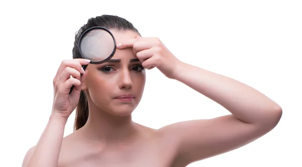 Woman in beauty concept with magnifying glass aging wrinkles — Stock Photo, Image