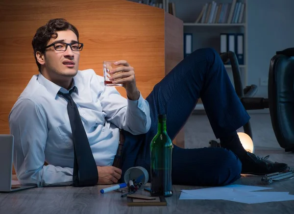 Stressed businessman working overtime in depression — Stock Photo, Image