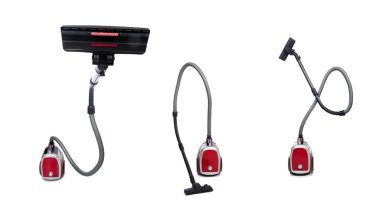 Beyaz arkaplanda izole edilmiş elektrik süpürgesi