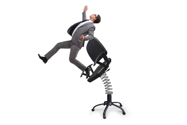 Концепція просування з бізнесменом, викинутим з крісла — стокове фото