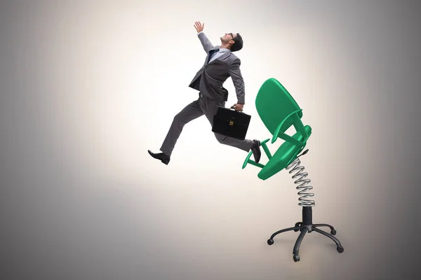 Concepto de promoción con empresario expulsado de la silla — Foto de Stock