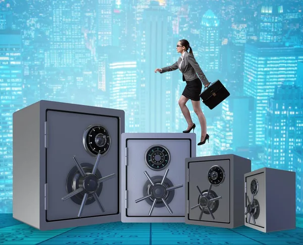 Businesswoman walking on top of safe — Stock Photo, Image
