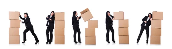 Vrouw met een heleboel dozen op wit — Stockfoto