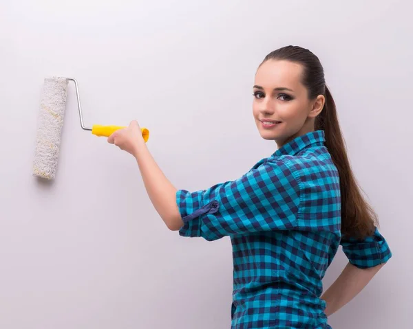 Woman painting house in DIY concept — Stock Photo, Image