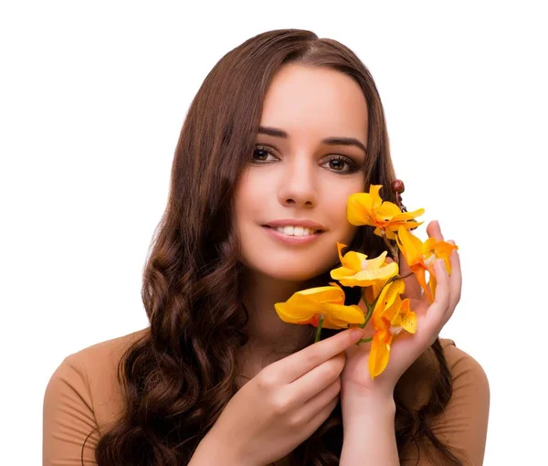 Mulher bonita com flor de orquídea isolada em branco — Fotografia de Stock