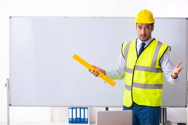 Young male architect in presentation concept — Stock Photo, Image