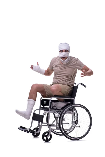 Injured man in wheel-chair isolated on white — Stock Photo, Image