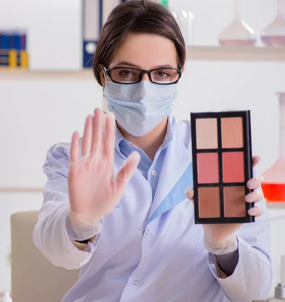 Lab chemist checking beauty and make-up products