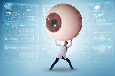 Doktor dev gözü tıbbi konseptte inceliyor.