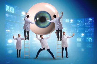 Doktor dev gözü tıbbi konseptte inceliyor.