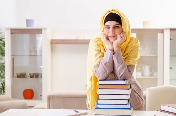 Female student in hijab preparing for exams — Stock Photo, Image