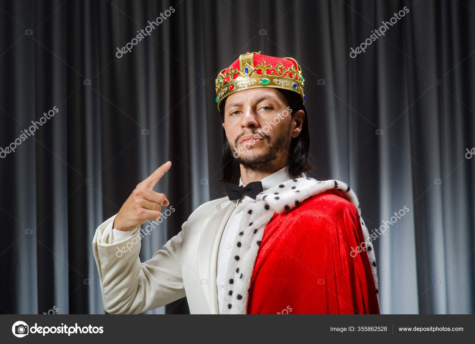 Funny king wearing crown in coronation concept Stock Photo by ©Elnur