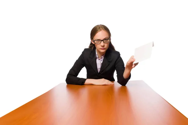 Female employee sitting at long table isolated on white — Stock Photo, Image