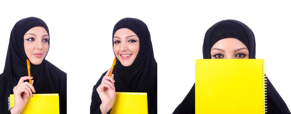 Mujer musulmana joven con libro sobre blanco —  Fotos de Stock